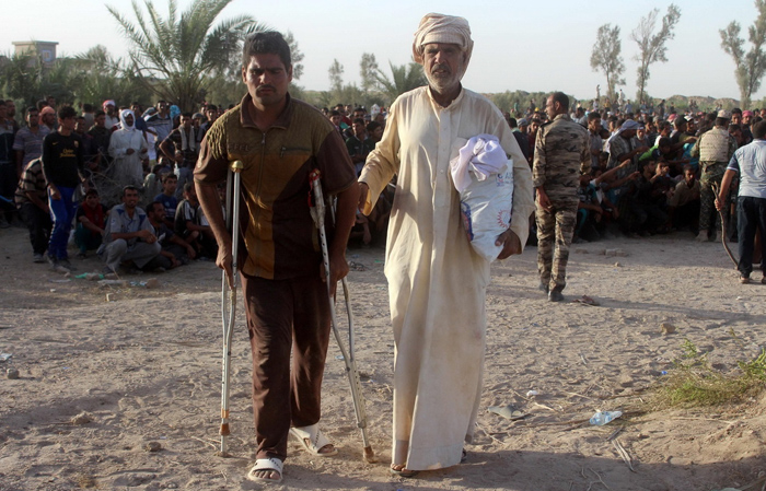 (تصاویر) بازگشت ساکنین شهر فلوجه (تصاویر) بازگشت ساکنین شهر فلوجه